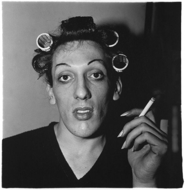 Diane Arbus: A young man in curlers at home on West 20th Street, N.Y.C. 1966. (© The Estate of Diane Arbus)